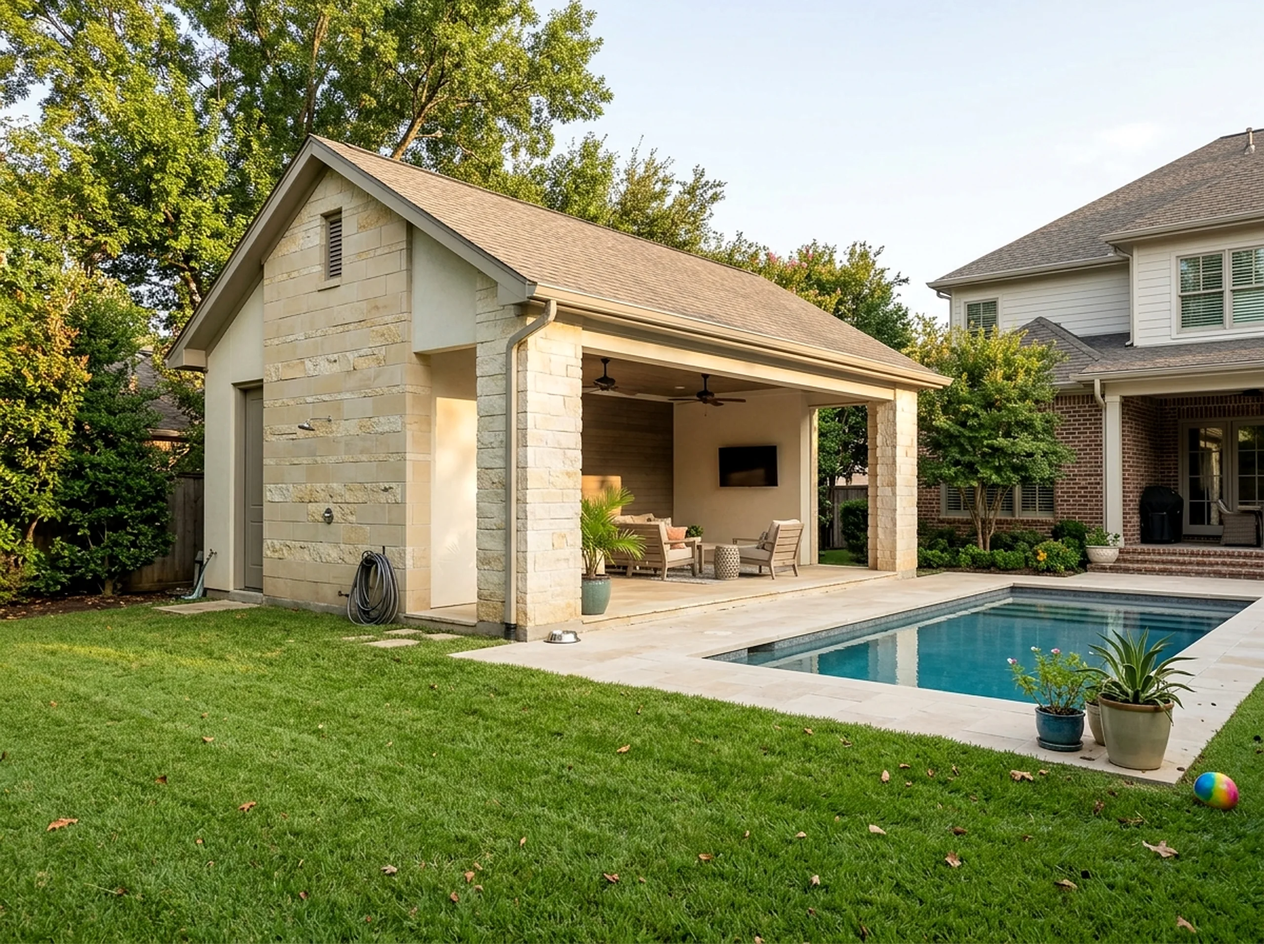 Smaller yard Limestone With a bath Modern pool house